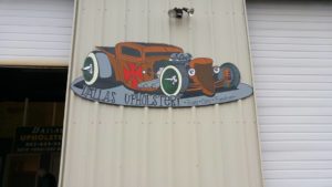 Dallas Upholstery hot rod sign on the building