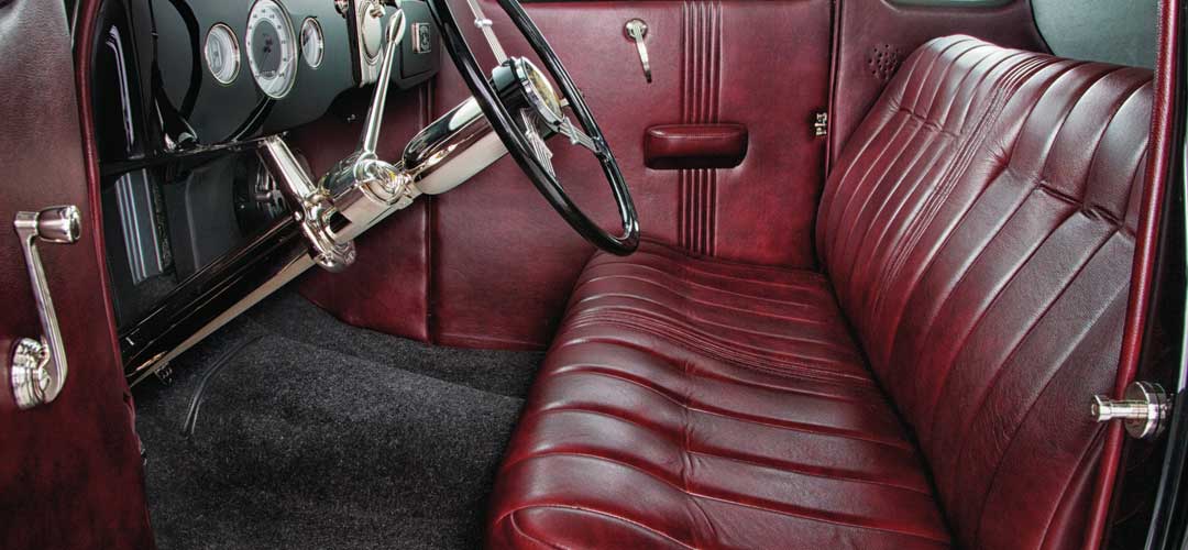 Custom red marbled leather interior in classic car