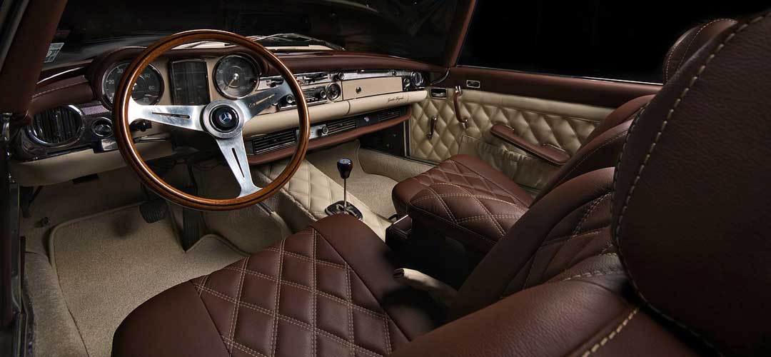 stunning brown and cream interior with custom stitching 