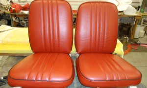 Matching set of aircraft seats in brown with black accents