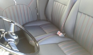Custom interior black leather with red stitching
