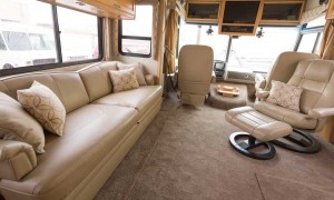luxurious and inviting light tan leather sofa and chair in a motor home 